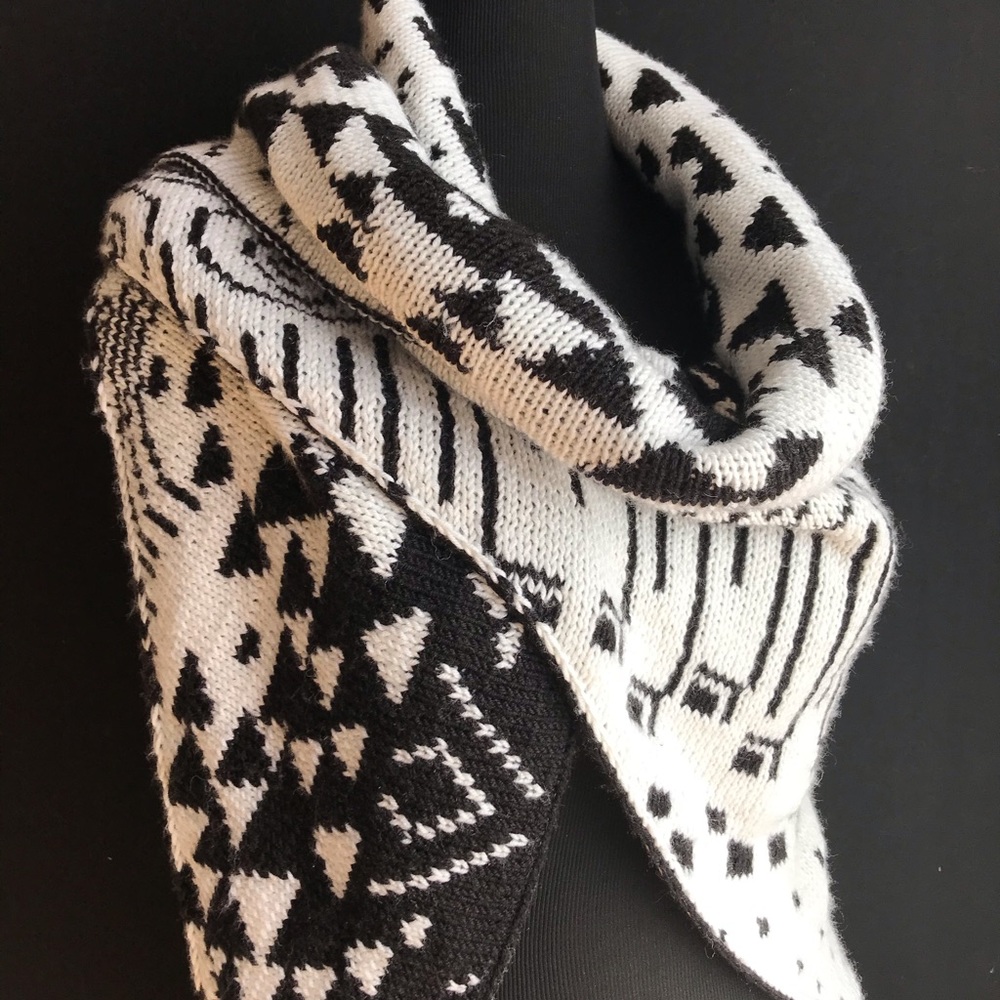Double knitted reversible shawl.
